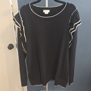 Black Sweater with White Accents and Ruffle Shoulders